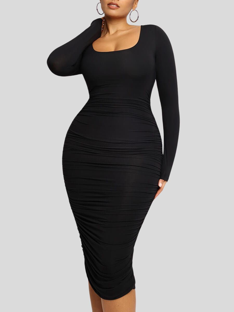 A stylish plus size black bodycon dress with ruched details, long sleeves, and a square neckline.